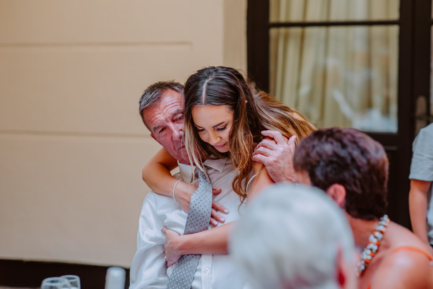 Emotion photo of the bride hugs her father 