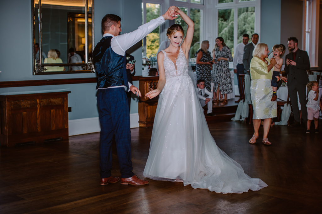 Bride and groom's first dance twirl 