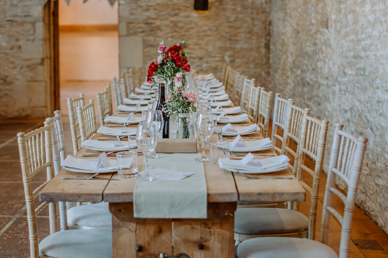 Beautifully decorated Oxleaze Barn wedding breakfast table 